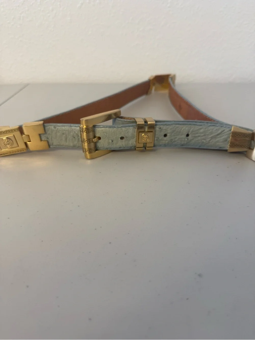 El General Belt Company Blue Genuine Ostrich Leather Gold Medusa Hardware Belt